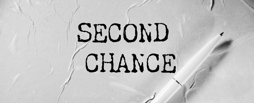 paper with the words 'SECOND CHANCE'