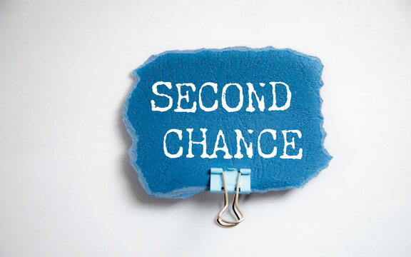 paper with the words 'SECOND CHANCE'