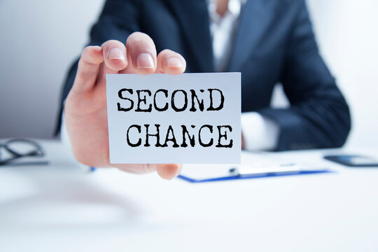 paper with the words 'SECOND CHANCE'