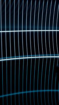 Blue glowing grid pattern with vertical and horizontal lines