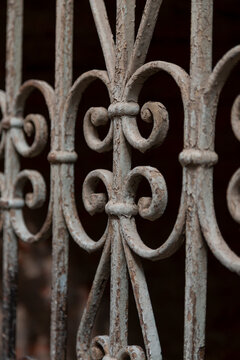 Close up of a weathered wrought iron gate with scroll ornaments, Tbilisi, Georgia