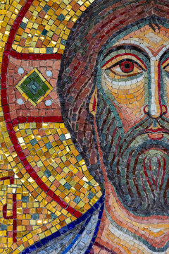 Detail of the face of Christ in a colorful stone and gold mosaic, Tbilisi, Georgia
