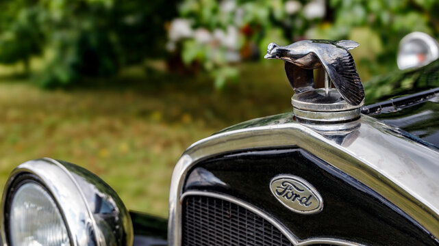 Historic Ford A hood ornament with bird design