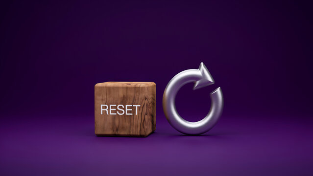 A wooden block with the word reset printed on it next to a metallic silver circular arrow icon on a dark purple background, symbolizing system restart and change concepts