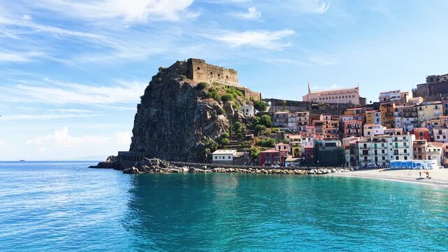 Scilla, Calabria, Italy. Scenic view of Marina Grande pebble beach, turquoise waters of the Tyrrhenian Sea
