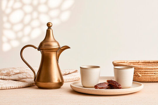 Traditional Arabic Coffee Dallah with Dates and Finjan Cups