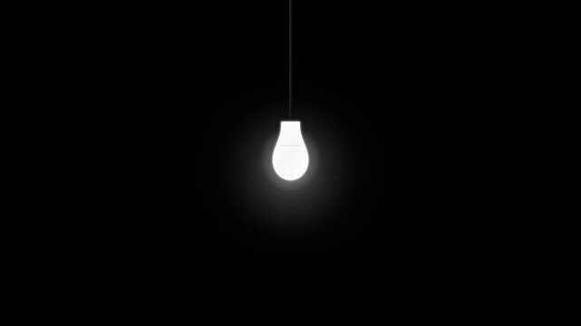 A brightly glowing light bulb suspended in total darkness, a beacon of hope and a powerful visual metaphor for creativity, solutions, or breakthrough moments