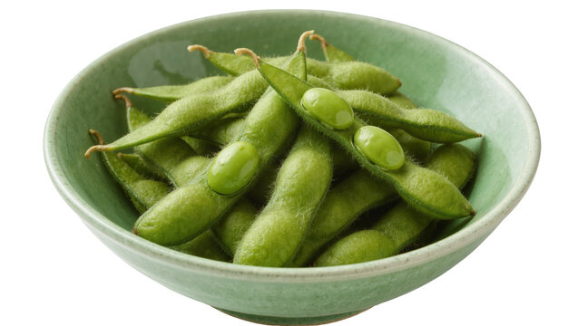 Fresh green edamame soybeans in a rustic light green ceramic bowl