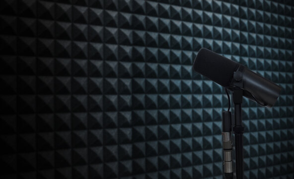 vocal microphone in recording studio with acoustic foam background