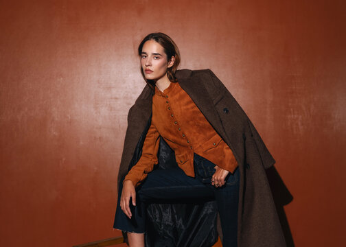 Elegant Woman in Brown Coat,autumn-inspired