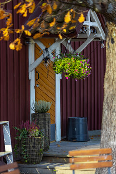Back door of a wooden building in autumn