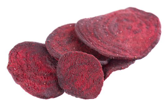 Crispy roasted beetroot chips with sea salt, isolated on white background. Healthy and crunchy natural vegetable snack. Clipping path.