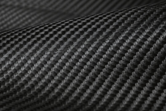 Plain weave carbon fiber texture under directional light