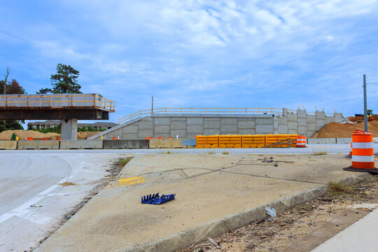 Workers are building new section bridge of reconstruction highway junction
