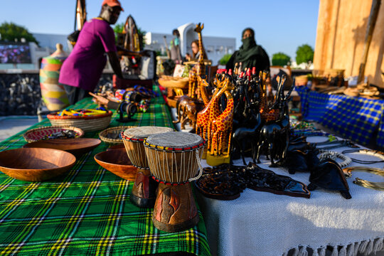 Doha, Qatar &ndash; November 29, 2023: Cultural exchange pavilions at Katara showcase traditional handicrafts, wooden sculptures, and drums inspired by authentic African heritage.
