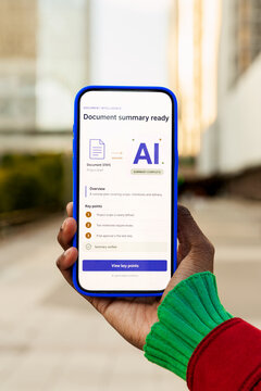 Gen-Z Black woman using smartphone AI document summary