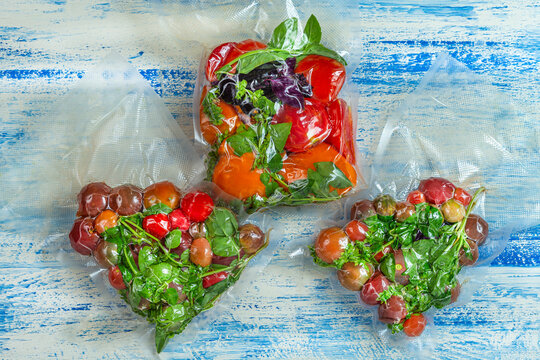 Fresh Vegetables Packed in Clear Bags on a Table