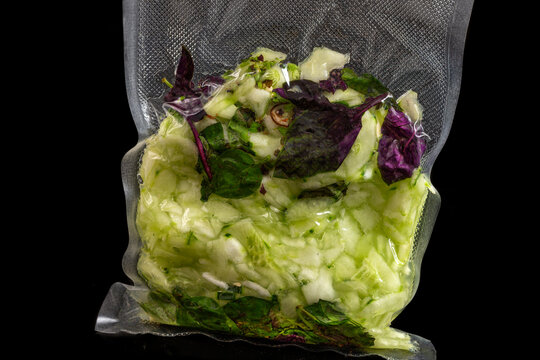 Fresh Herbs and Greens in a Sealed Bag