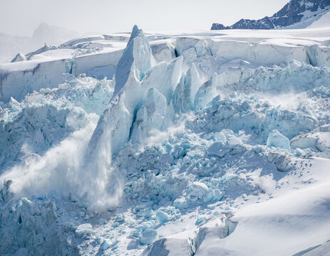 Serac Collapse in a Heavily Fractured Glacier Icefall with Falling Ice Debris