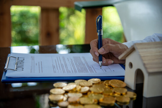 Business agent shake hand customer dealing real estate house agent signing contract. Mortgage Financial Planner hand holding advice plan banking insurance. Debt loan Home Investment Team handshaking