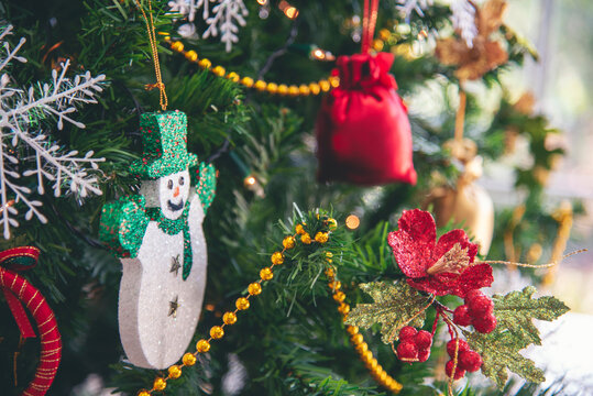 Background Christmas tree decorated holiday winter xmas celebration present gift decorate bauble ornament golden ball in cozy living room. Merry Christmas happy new year festival traditional concept