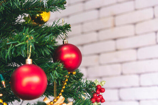 Background Christmas tree decorated holiday winter xmas celebration present gift decorate bauble ornament golden ball in cozy living room. Merry Christmas happy new year festival traditional concept