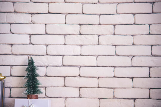 Background Christmas tree decorated holiday winter xmas celebration present gift decorate bauble ornament golden ball in cozy living room. Merry Christmas happy new year festival traditional concept