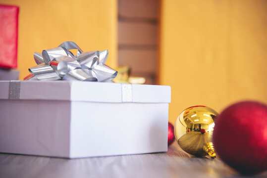 Christmas present gift box under bauble christmas tree decorated holiday winter xmas happy new year celebration. Present gift boxes to family decor in cozy living room. Merry Christmas happy new year