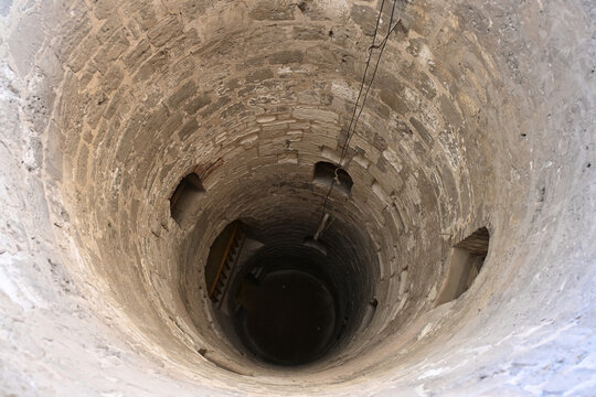 Bird's Eye View of Subterranean Well Leading into the Catacombs of Alexandria, Egypt
