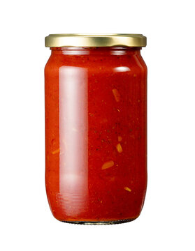 Glass jar of tomato sauce with golden lid isolated on transparent background