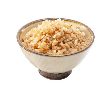 Steamed cooked brown rice in a ceramic rice bowl isolated on transparent background