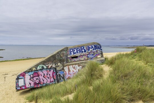 Bunker complex from the 2nd world war with graffiti on the beach of Saint Pierre, Locmariaquer, D&eacute;partement Morbihan, France