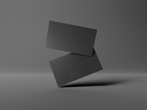 Two black business cards floating on black background Mockup. Blank american size calling card. 3D rendering