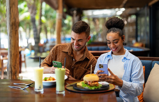 Happy couple enjoying quality time together, sharing laughter, love, and enjoying food together