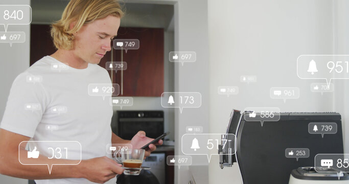 Image of social media notifications over using smartphone having coffee in sunny kitchen