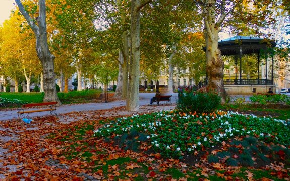 City park with flower, trees and fountain in autumn season with promenade, and colorful landscape, Zagreb, Croatia