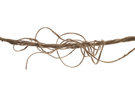 Natural rough jute rope and rustic twine string intertwined isolated on white background