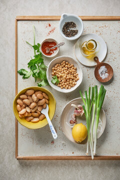 Vegan white bean and chickpea salad ingredients prepared overhead