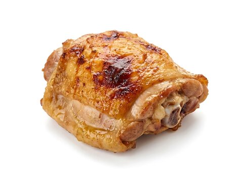 Raw chicken thigh piece with colorful seasoned vegetable spices and herbs for cooking. chicken thigh cutouts