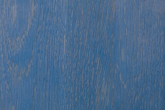 Blue stained wood grain texture background with natural patterns