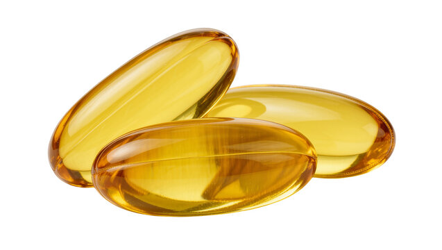 Three golden yellow translucent omega 3 fish oil softgel capsules