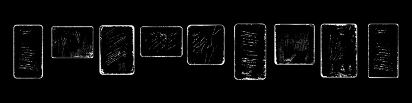 Worn grunge card frames with scratches on a black background