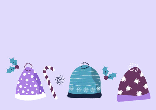 Banni&egrave;re vectorielle illustr&eacute;e sur le th&egrave;me de l'hiver avec des bonnets color&eacute;s, du houx, des flocons et du sucre d'orge. Ressource graphique encadrement avez zone pour mettre du texte.