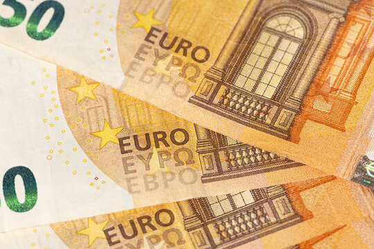 close up of fifty euro banknotes fanned out abstract background