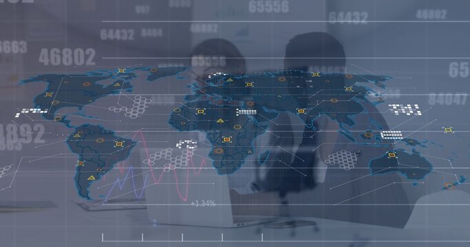 Translucent dashboard displaying world map and data points over two seated silhouettes at desk