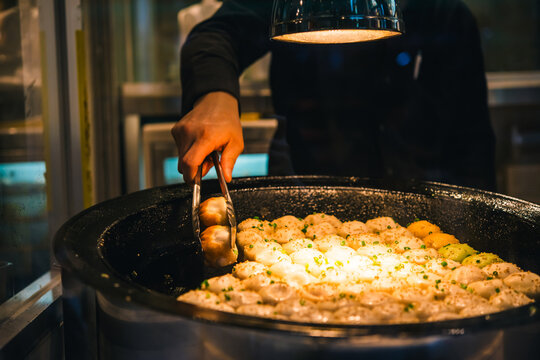 Making of Sheng Jian Bao, traditional Shanghai-style pan-fried soup dumpling.