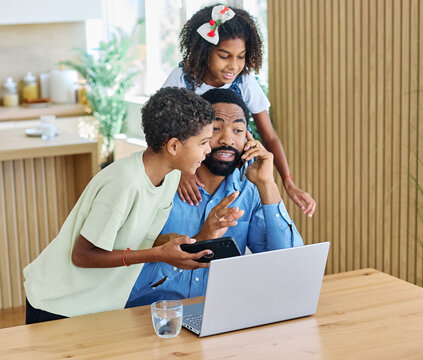 Portrait of ayoung businessman working on laptop from home distracted by surrounding noisy children. Fatherhood, childhood, family, freelance job, home office concept