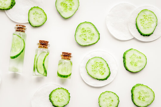 Sliced cucumber for face mask on white background top view