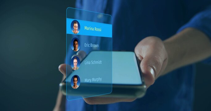 Hands holding smartphone showing blue holographic contact list on dark backdrop, copy space