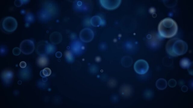 Soft glowing blue circles drift gently across a deep dark background, creating a serene and dreamy atmospheric mood with transparent bubble textures.